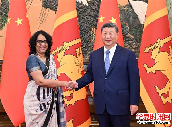 习近平会见斯里兰卡总理阿马拉苏里亚